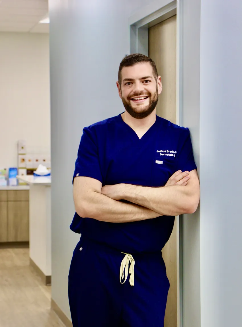 Dr. Joshua Brady in the hallway at Tampa Bay Dermatology